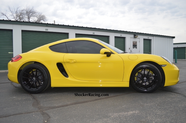 Racing Yellow Porsche Cayman 981 with O.Z. Leggera Wheels
