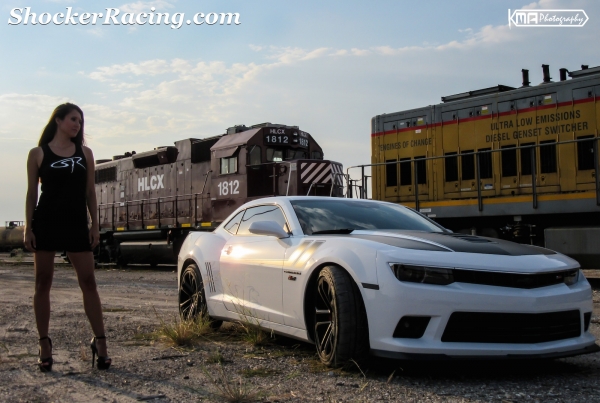 Kristen Benavides with Michael Vaughn's Camaro