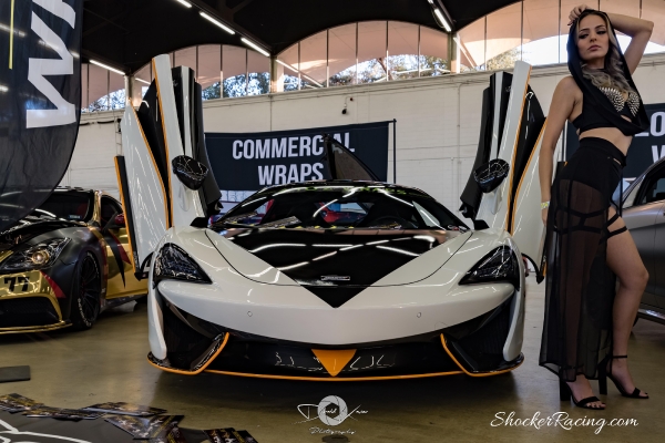 Samantha Kaye at Spocom Texas 2017 with a Mclaren